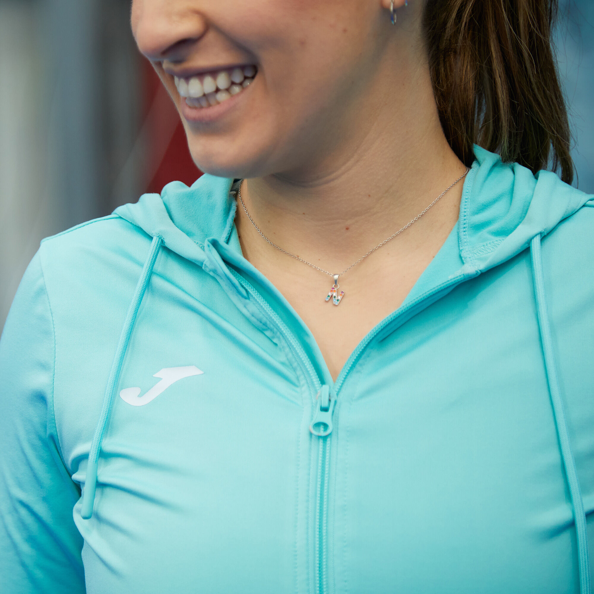 Turquoise sales running jacket