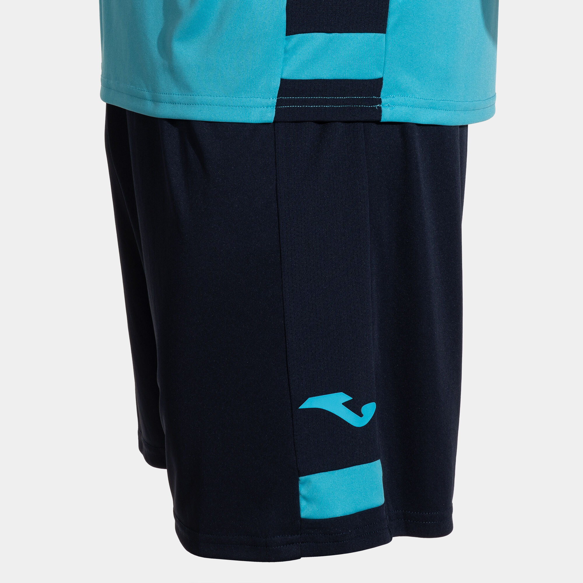 Set man Lider fluorescent turquoise dark navy | JOMA®