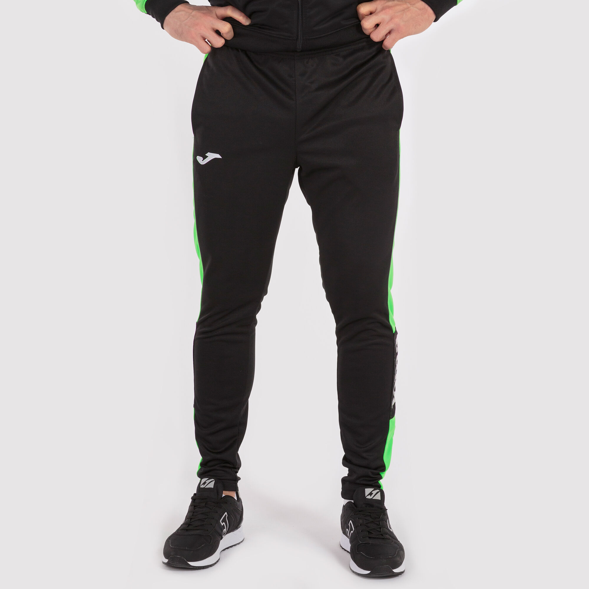 Pantalón largo hombre Championship IV negro verde flúor