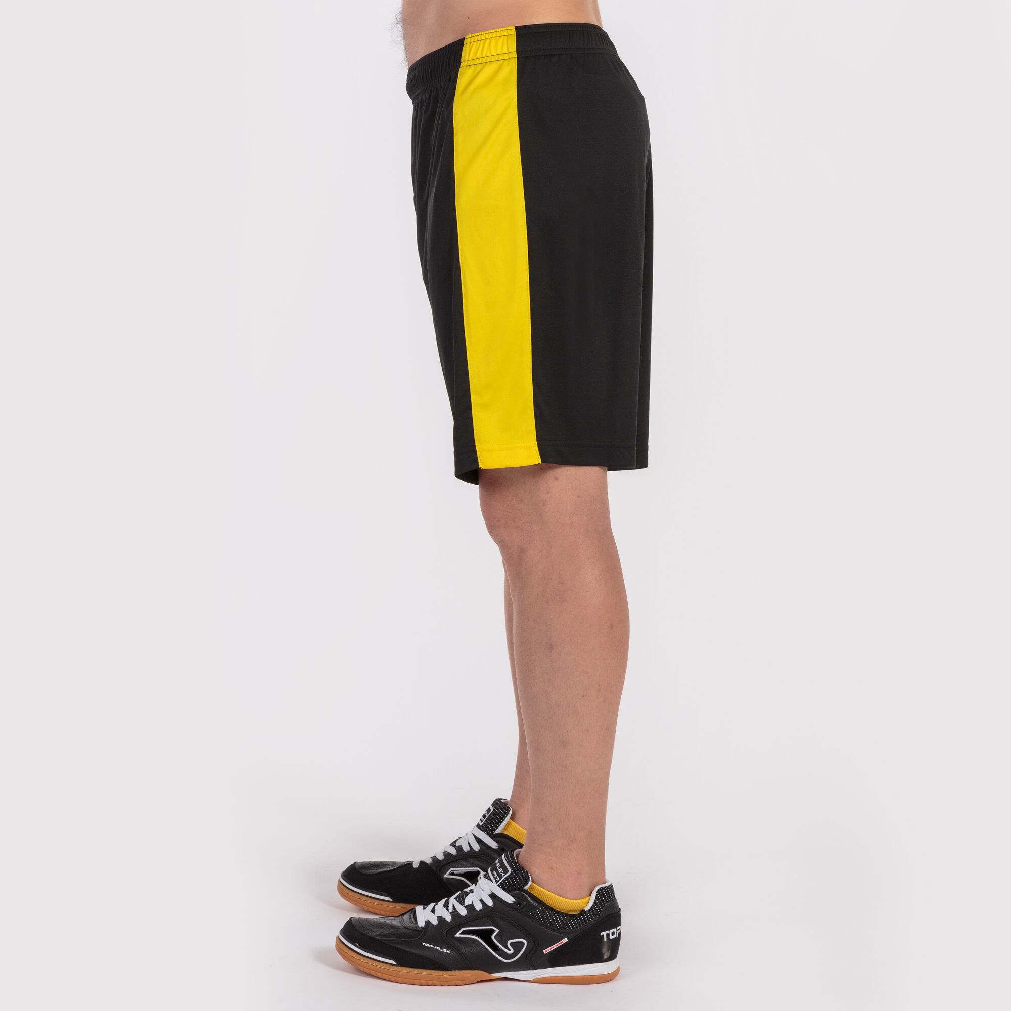 Yellow and black shorts top