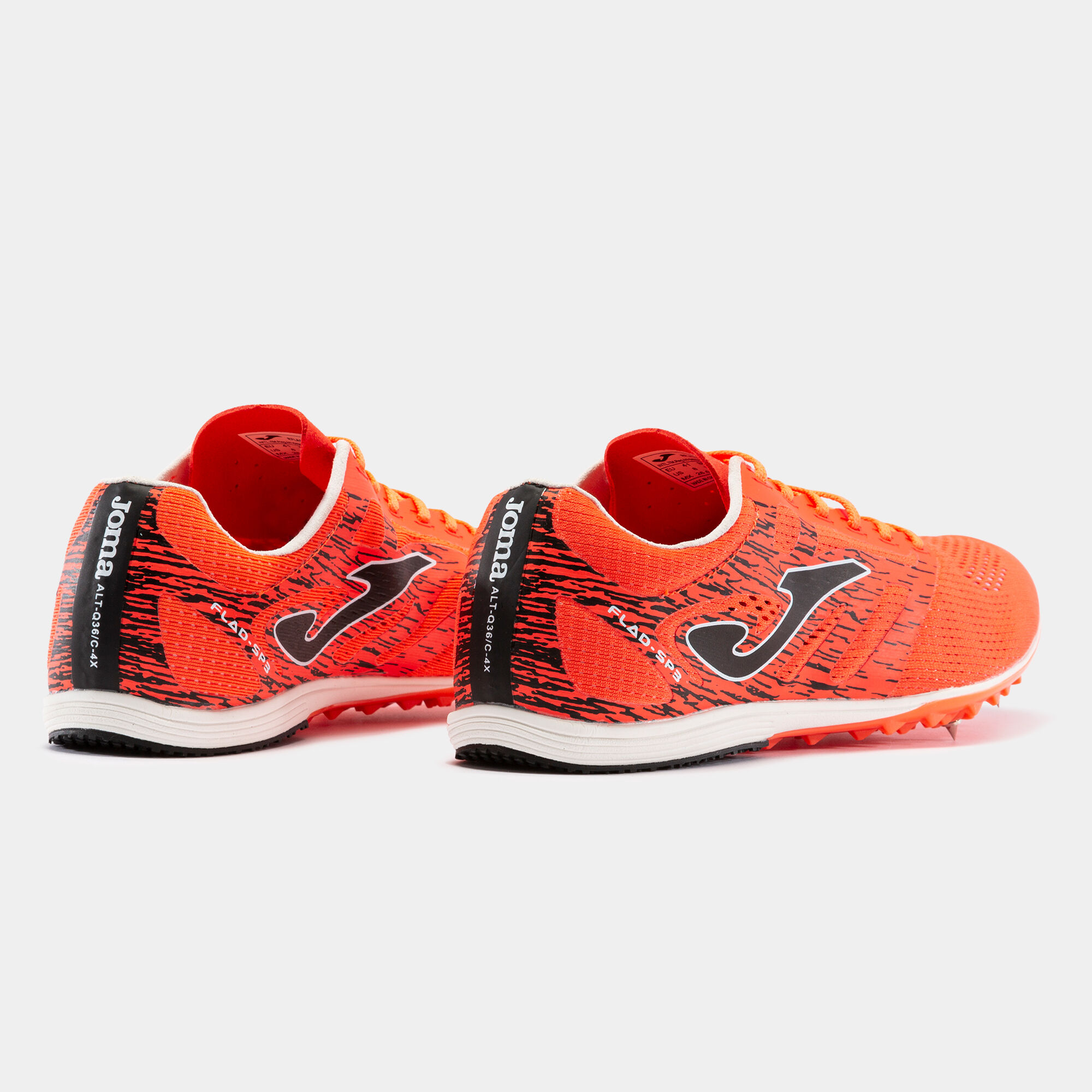 Zapatillas running Flad 21 clavos unisex coral