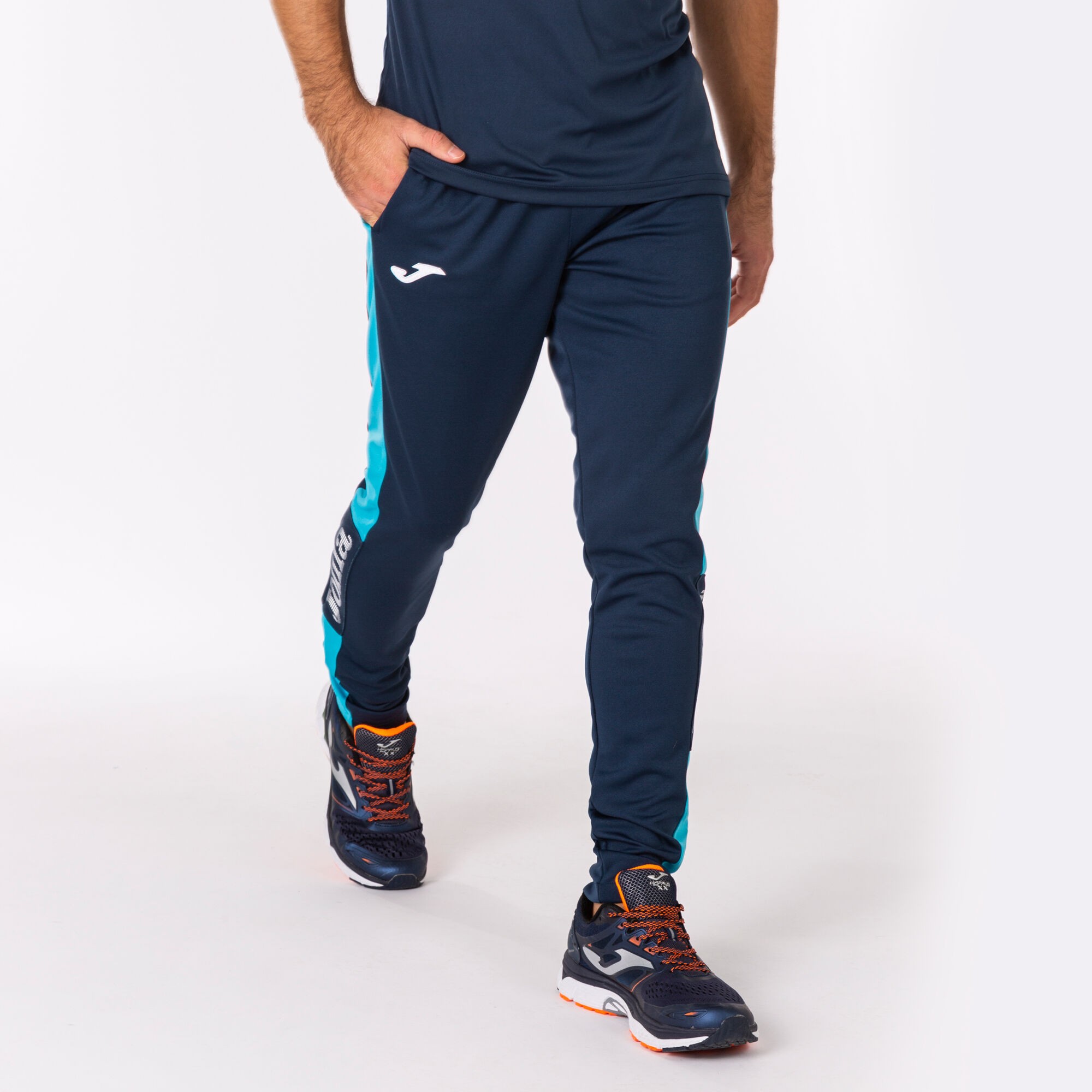 Longs pants man Championship IV navy blue fluorescent turquoise