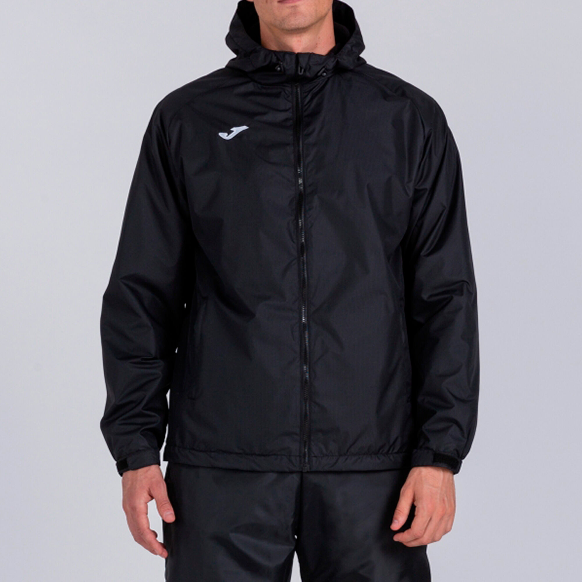Chubasquero best sale negro hombre