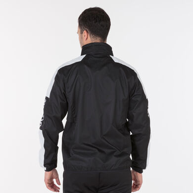 Chubasquero hombre Championship IV negro blanco