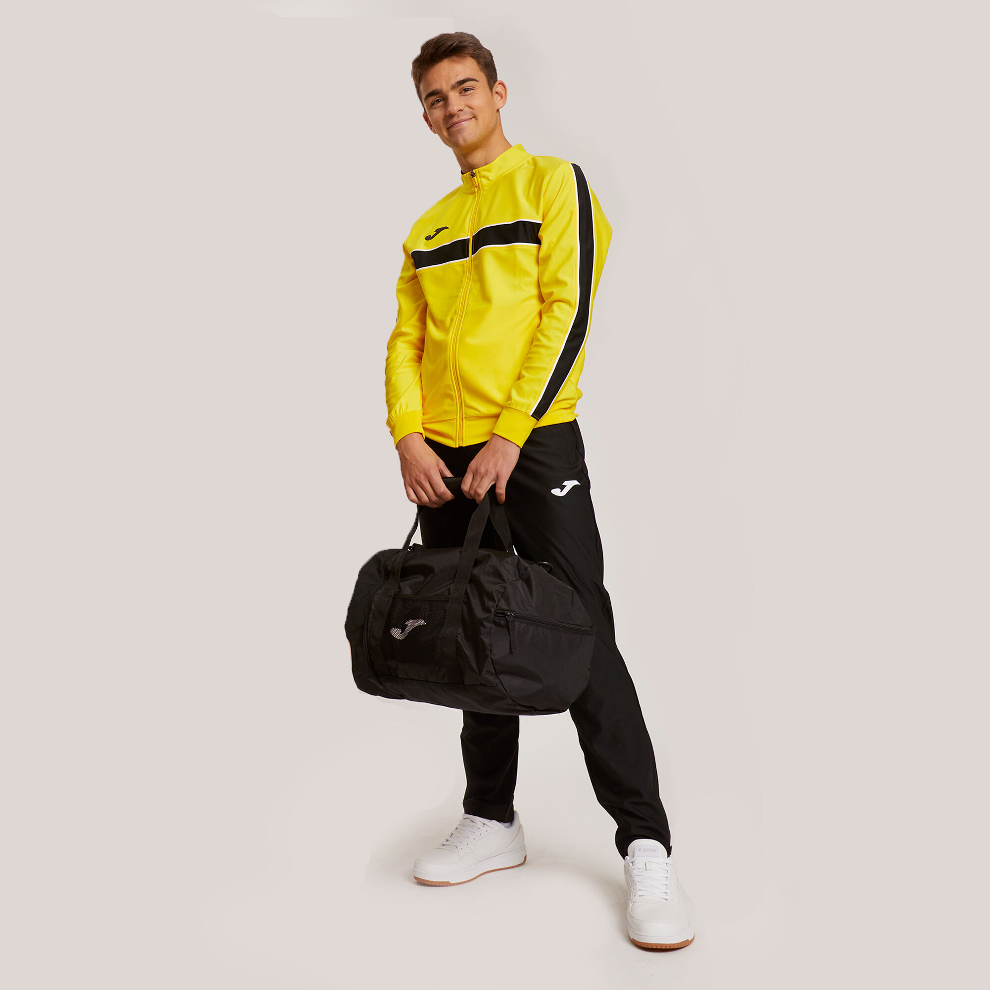 black and yellow nike tracksuit
