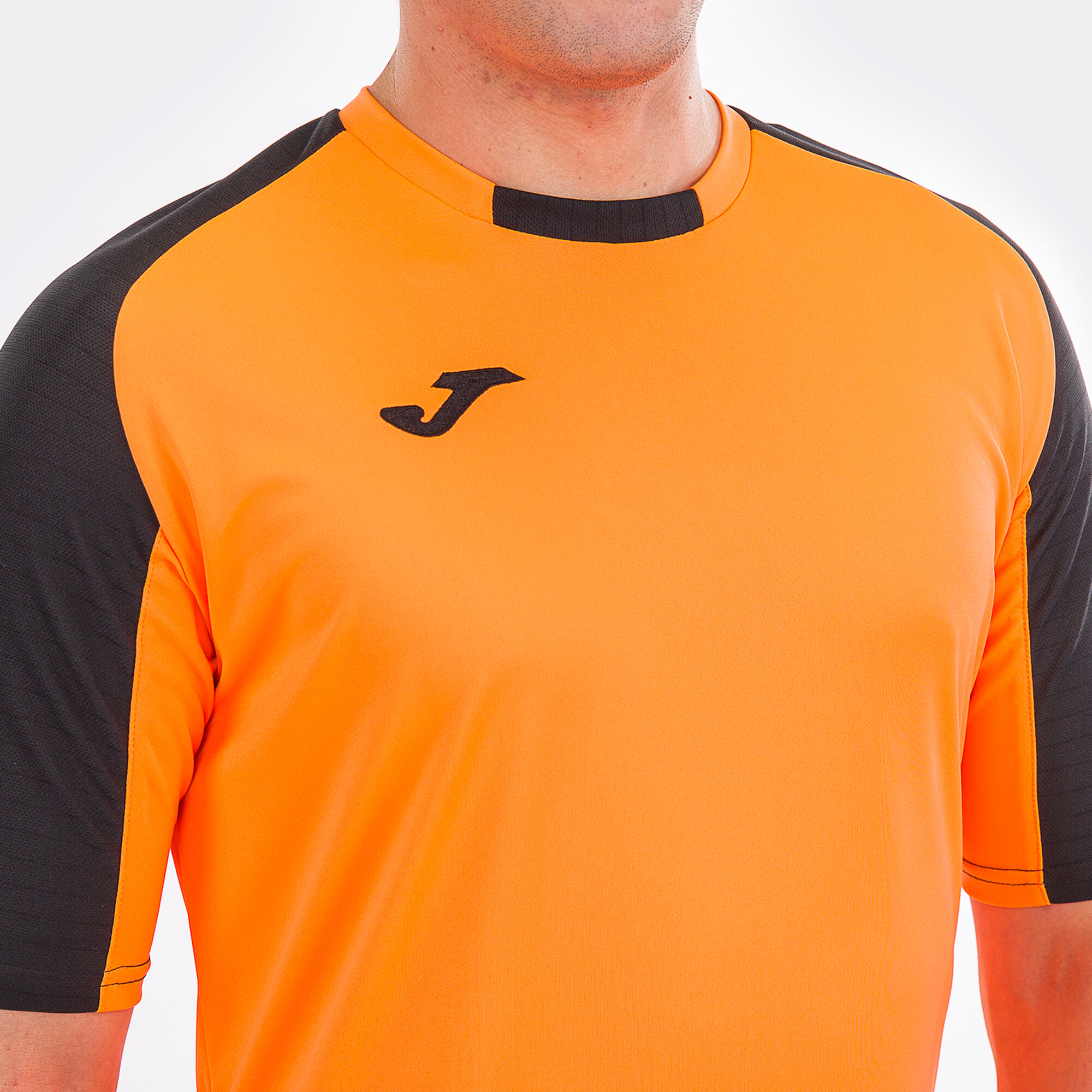 Camiseta naranja best sale y negra