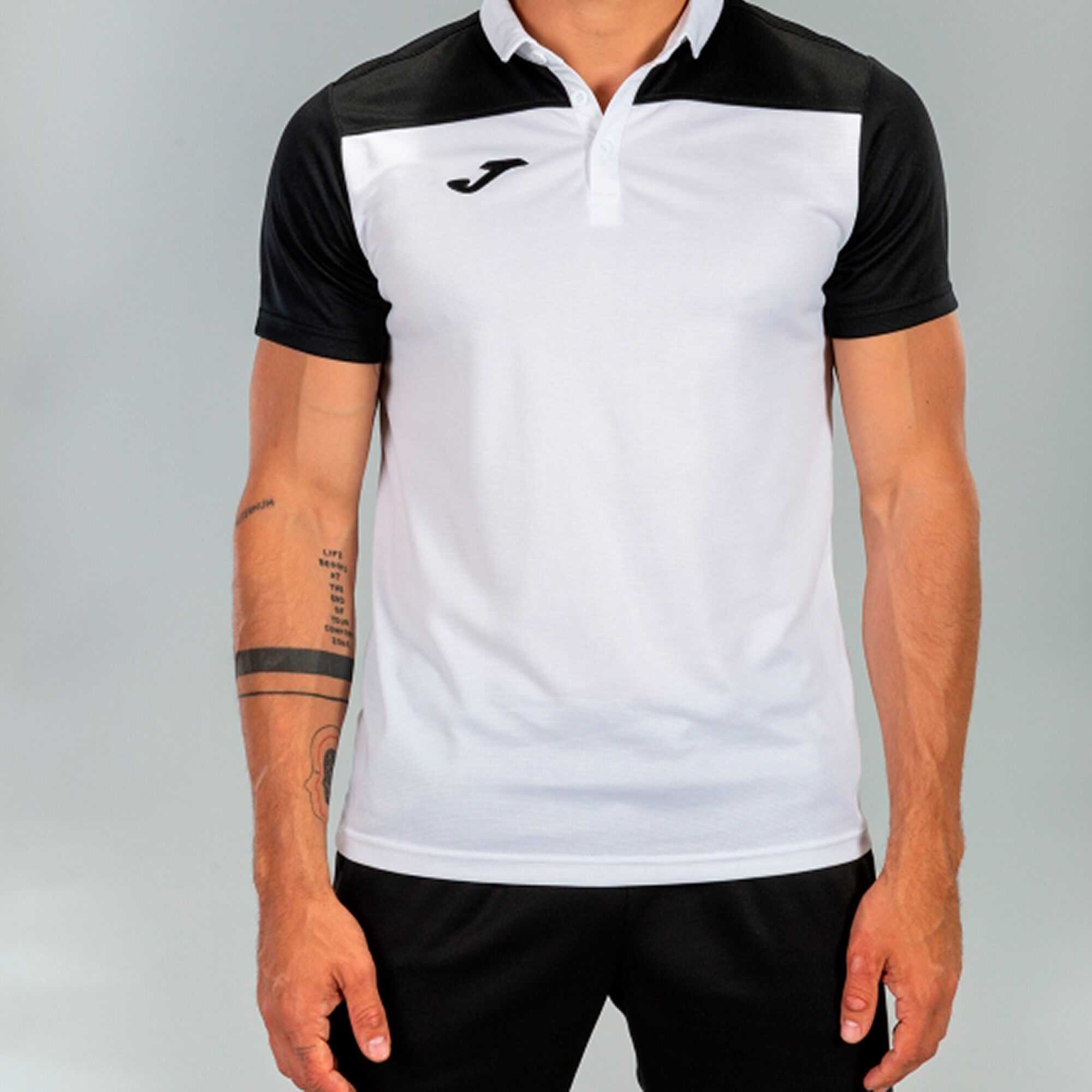 POLO MANCHES COURTES HOMME HOBBY II BLANC NOIR