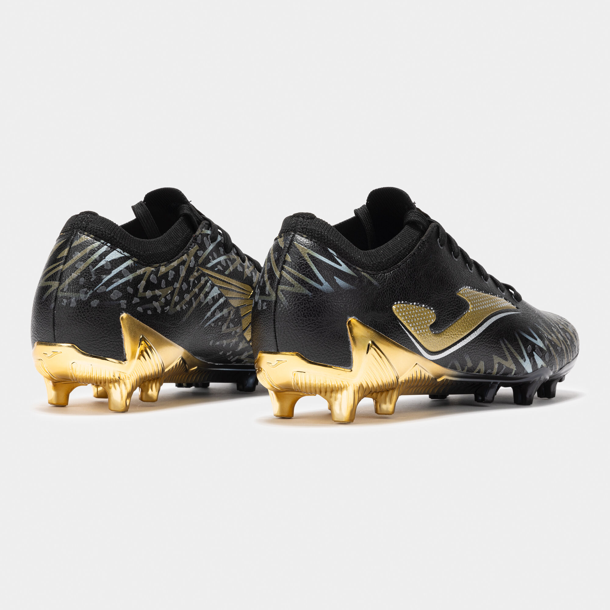 Football boots Striker 25 firm ground FG black | JOMA®