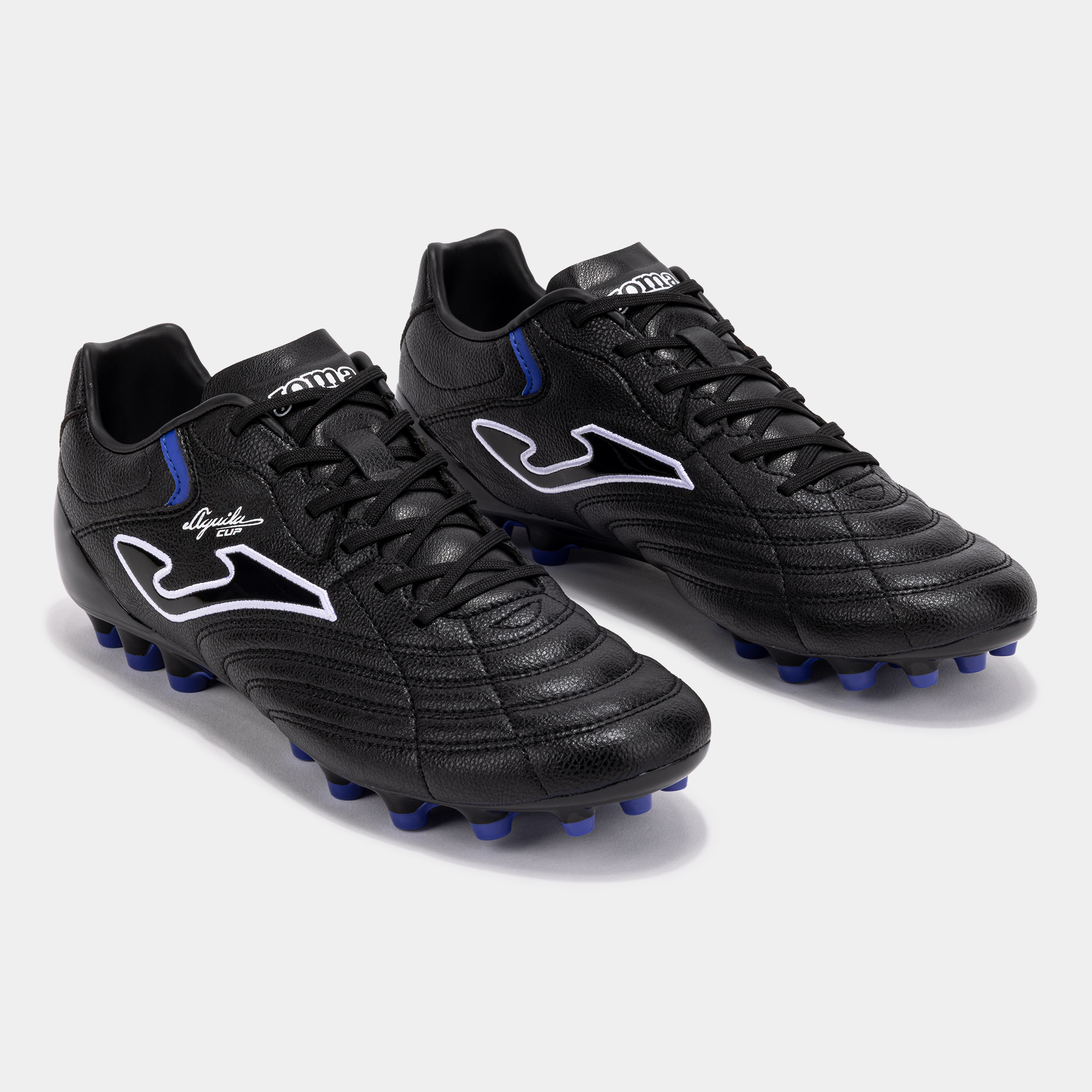 Football boots for artificial turf, natural grass and carpet | JOMA